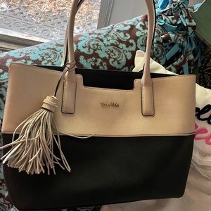 Calvin  Klein totes Purse.  2-Tone color. Beautiful bag.